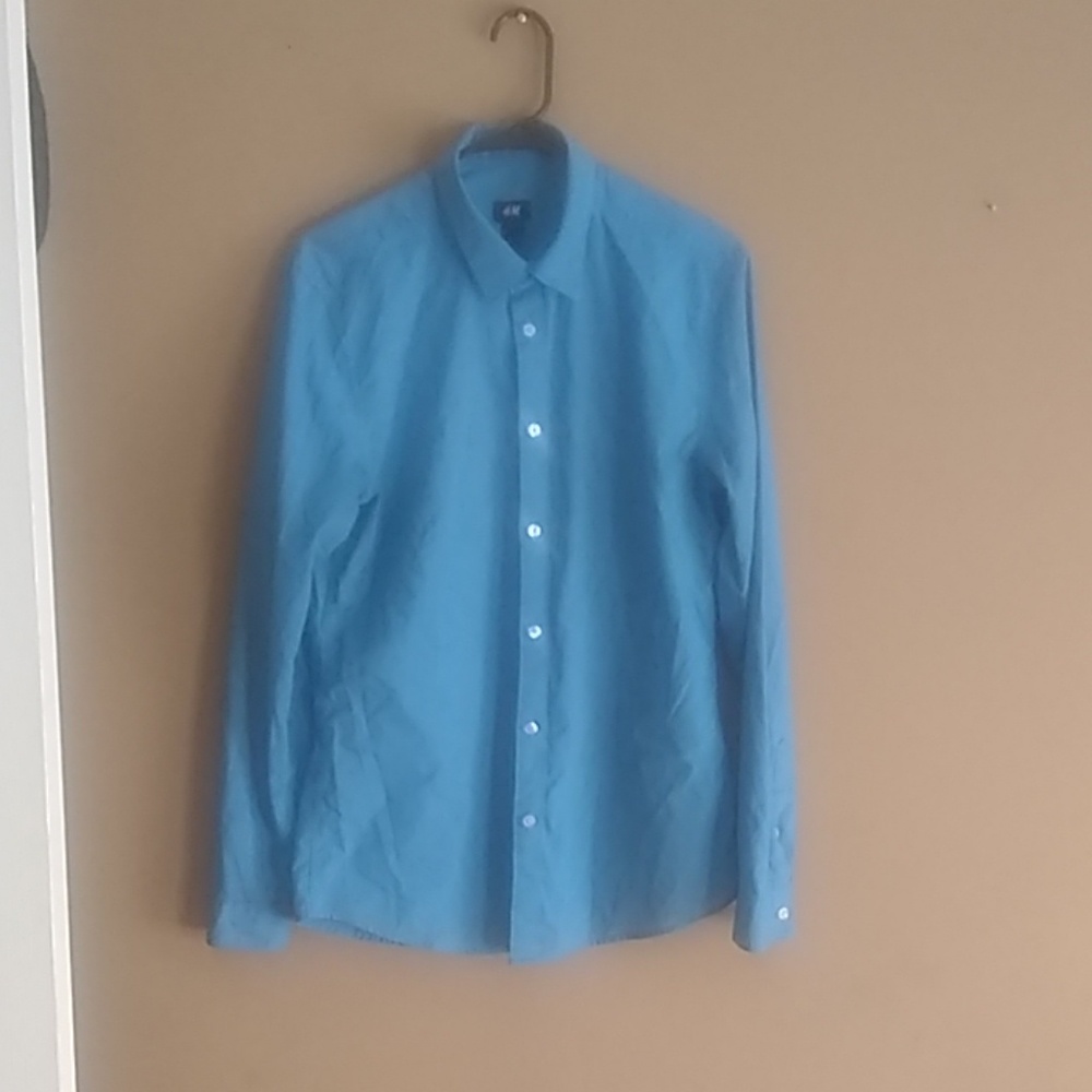 Long sleeve blue collared shirt button down